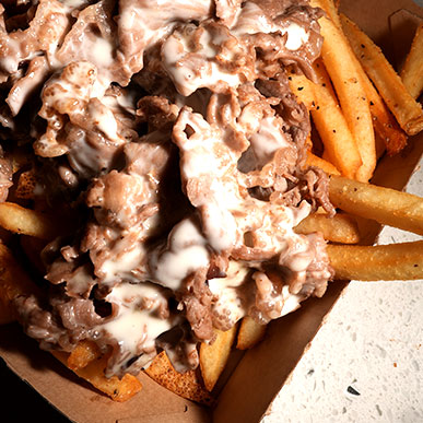 Loaded Cooper Fries Cooked In Beef Tallow